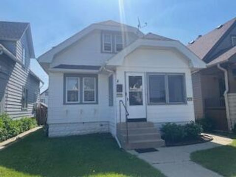 Photo of 1648 S 69th St, West Allis, WI 53214 (MLS # 1936404)