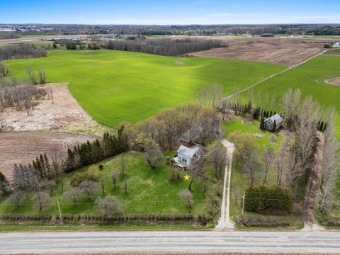 Photo of 7047 W Custer St, Manitowoc, WI 54220 (MLS # 1960962)