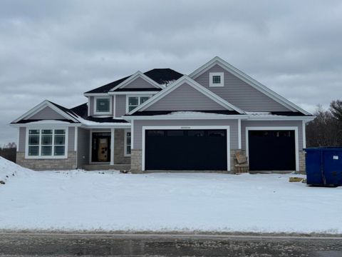 Photo of W207N5766 Muirfield Dr, Menomonee Falls, WI 53051 (MLS # 1930550)