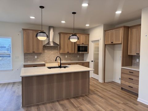 Photo of W149N11976 Red Holly Dr, Germantown, WI 53022 (MLS # 1951128)