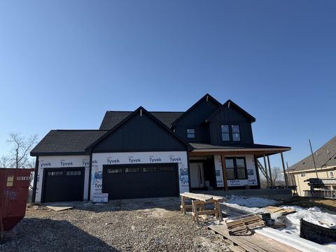 Photo of N66W21485 Sagebrush Dr, Menomonee Falls, WI 53051 (MLS # 1950613)