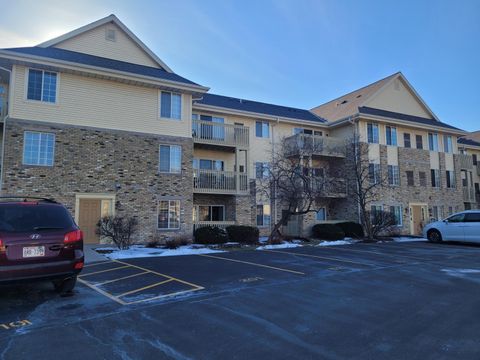 Photo of 530 Windstone Dr, Hartland, WI 53029 (MLS # 1952852)