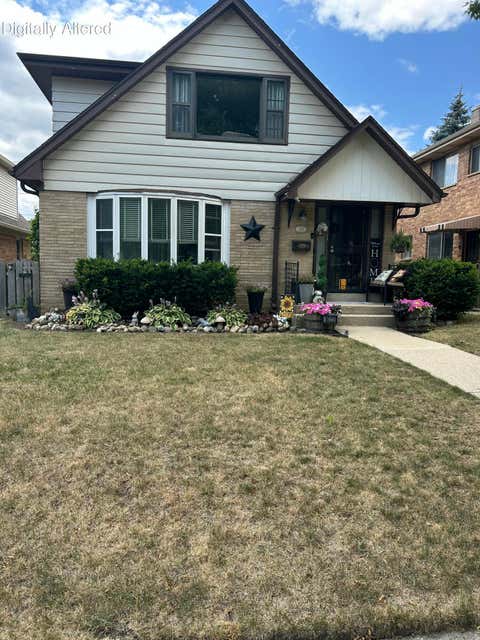 Photo of 8023 W Beckett Ave, Milwaukee, WI 53218 (MLS # 1976365)