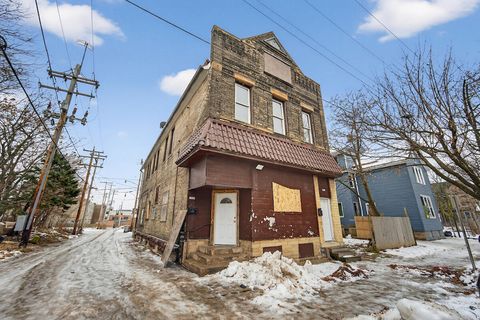 Photo of 1227-1229 W Juneau Ave, Milwaukee, WI 53233 (MLS # 1945697)