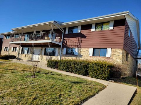 Photo of 8322 W Howard Ave, Milwaukee, WI 53220 (MLS # 1953238)