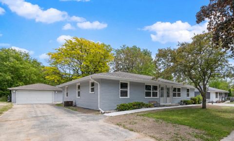Photo of 513 Bender Rd, West Bend, WI 53090 (MLS # 1965410)