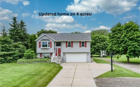 Photo of N64W14152 Mill Rd, Menomonee Falls, WI 53051 (MLS # 1924993)