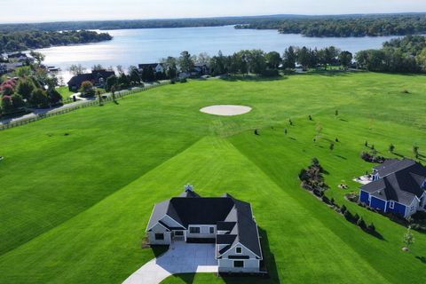 Photo of N66W34839 Baltic Pass, Oconomowoc, WI 53066 (MLS # 1956778)