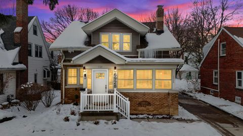 Photo of 6928 W Wisconsin Ave, Wauwatosa, WI 53213 (MLS # 1945140)