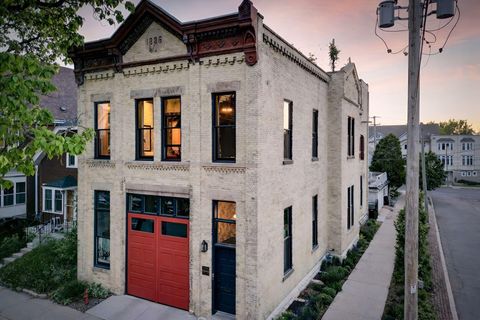 Photo of 1945 N Bartlett Ave, Milwaukee, WI 53202 (MLS # 1962427)