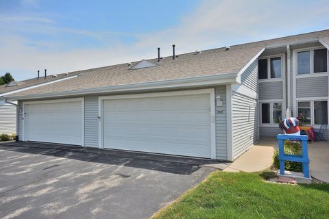 Photo of 306 Hartford Sq, Hartford, WI 53027 (MLS # 1971889)