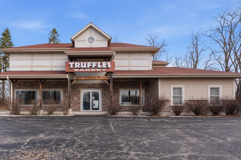 Photo of N112W15352 Mequon Rd, Germantown, WI 53022 (MLS # 1955693)