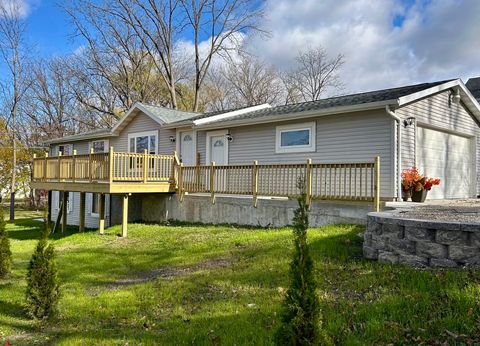 Photo of 711 Division St, Delafield, WI 53018 (MLS # 1946824)