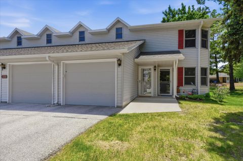 Photo of 728 Woodview Ave, Sheboygan Falls, WI 53085 (MLS # 1965905)