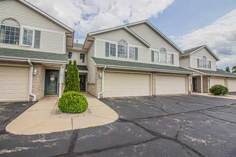 Photo of 622 Shepherds Dr, West Bend, WI 53090 (MLS # 1973651)