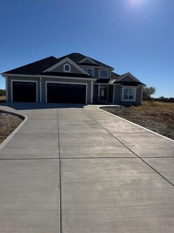 Photo of 611 Talbots Woods Dr, Dousman, WI 53118 (MLS # 1985643)