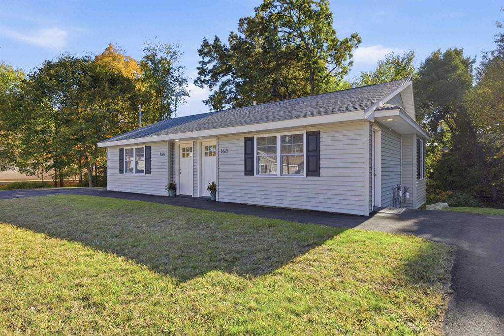 Photo of 166168 Comeau Street, Manchester, NH 03102 (MLS # 5115212)