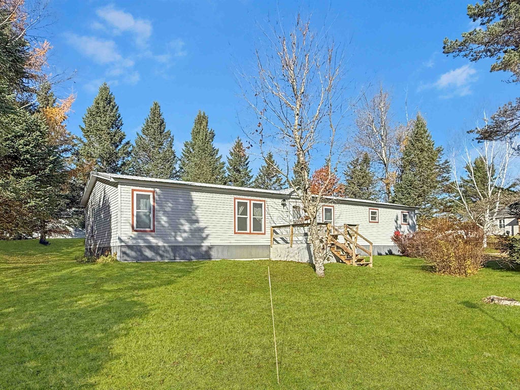 Photo of 46 Couture Street, Colebrook, NH 03576 (MLS # 5116161)