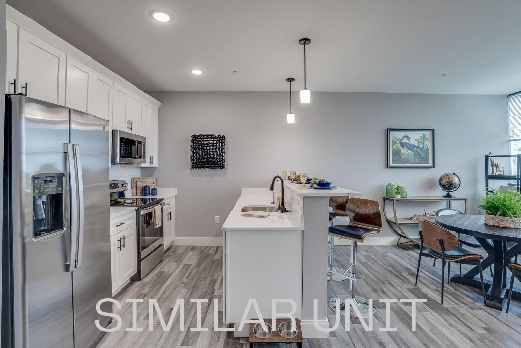 Photo of 1230 Elm Street #412, Manchester, NH 03101 (MLS # 5108005)