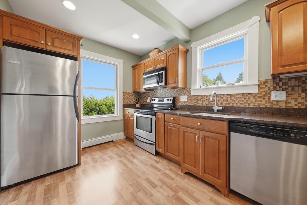 Photo of 223 Highland Street, Manchester, NH 03104 (MLS # 5104936)