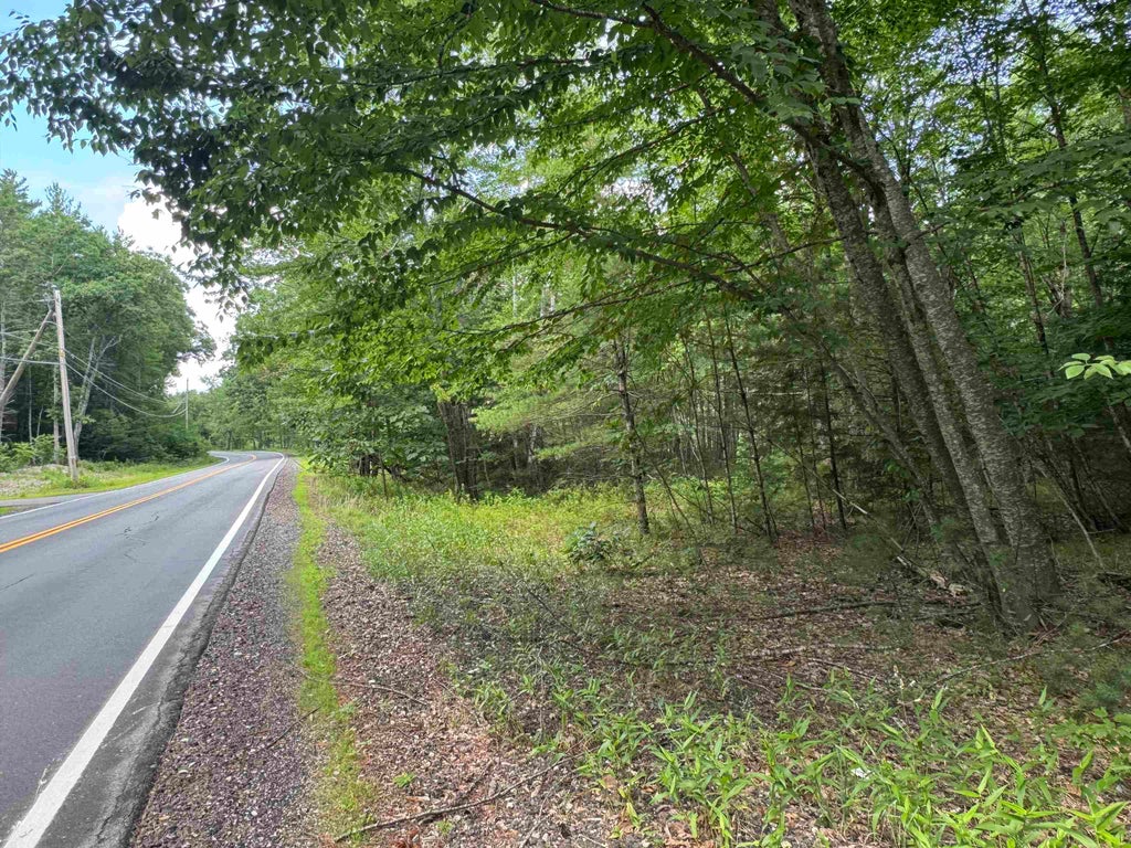 Photo of 140 Parker Mountain Road, Barrington, NH 03825 (MLS # 5099399)