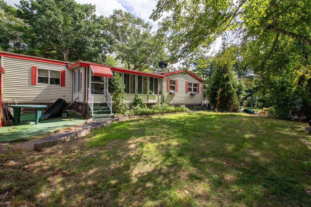 Photo of 11 N Dewberry Lane, Rochester, NH 03867 (MLS # 5105835)