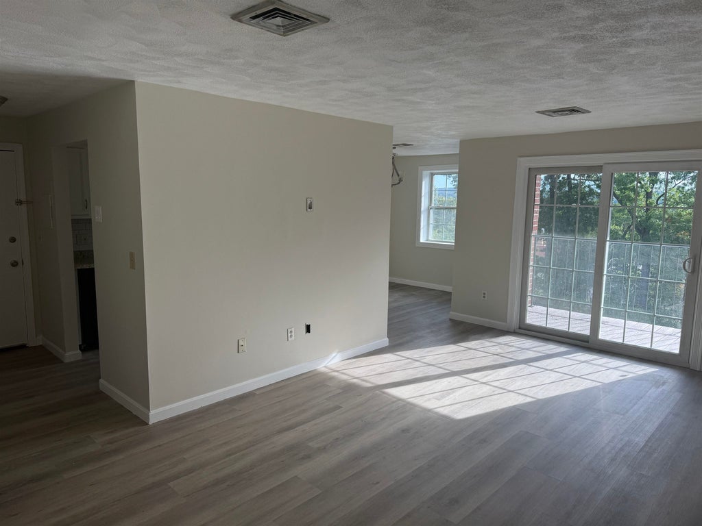 Photo of 7 Louisburg Square #7-10, Nashua, NH 03060 (MLS # 5110938)
