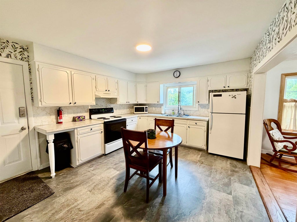 Photo of 439 1St Avenue, Berlin, NH 03570 (MLS # 5108423)