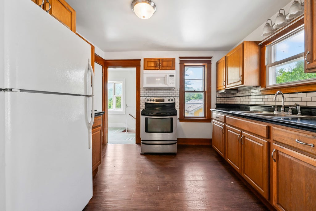 Photo of 419 Hillside Avenue, Berlin, NH 03570 (MLS # 5099125)
