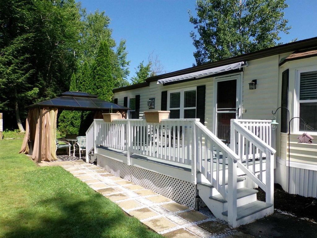 Photo of 303 Old Lake Shore Road #K1, Gilford, NH 03249 (MLS # 5103641)