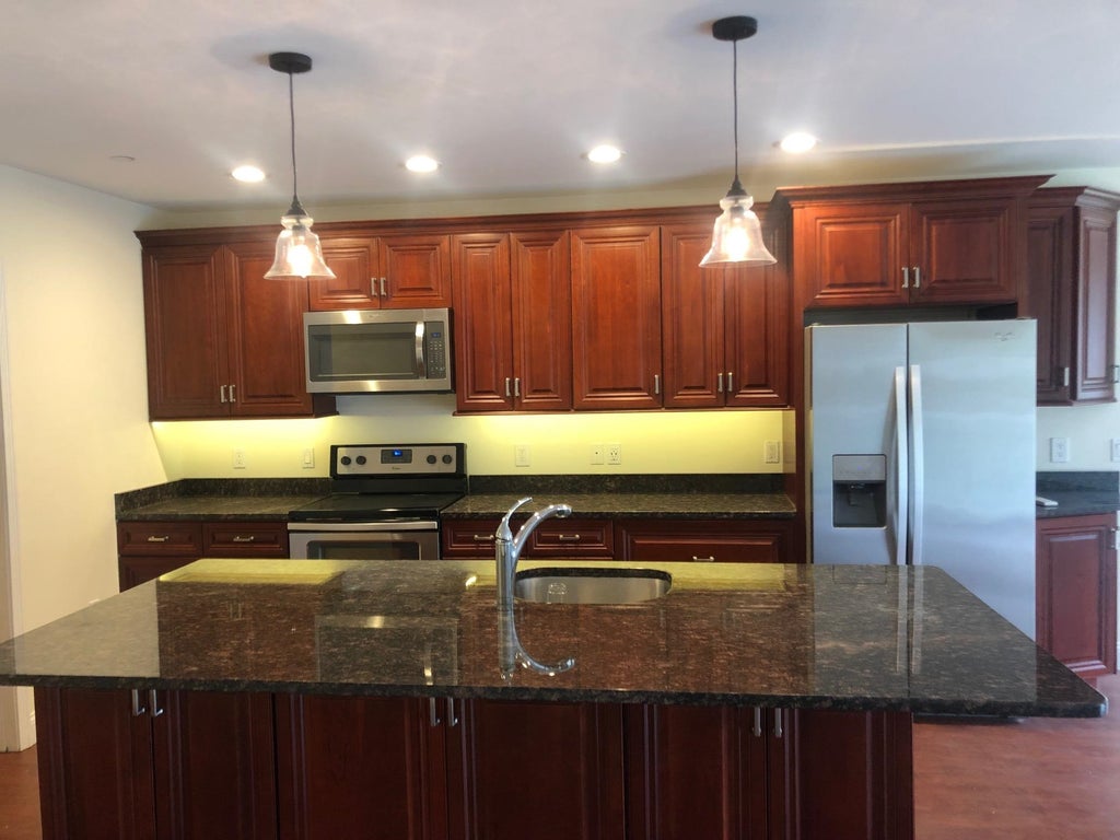 Photo of 19 Kendall Pond Road #205, Derry, NH 03038 (MLS # 5105567)