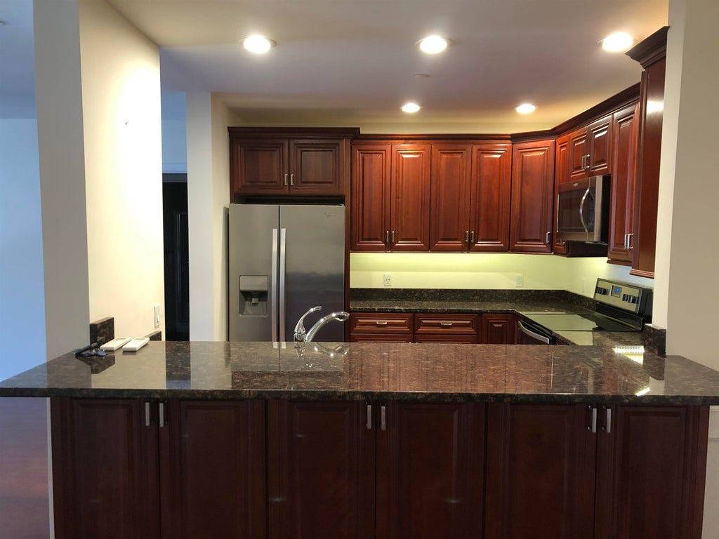 Photo of 19 Kendall Pond Road #206, Derry, NH 03038 (MLS # 5115027)