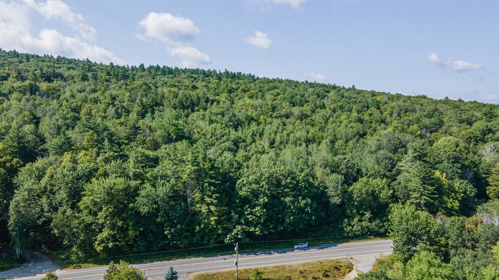 Photo of 628 Route 103 St, Sunapee, NH 03782 (MLS # 5107574)