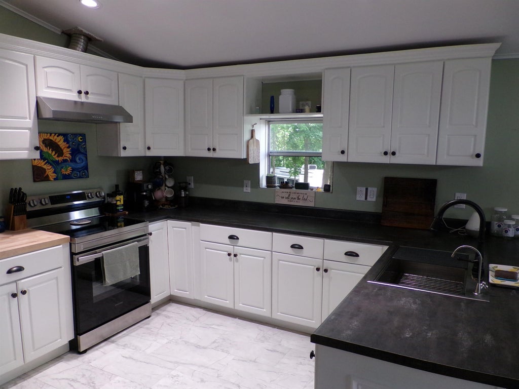 Photo of 13 Pear Street, Laconia, NH 03246 (MLS # 5092930)