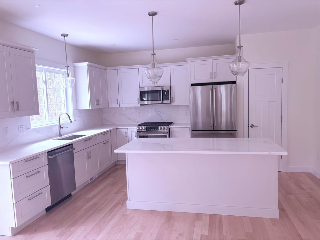 Photo of 10 Charlotte Drive #4, Dover, NH 03820 (MLS # 5092496)