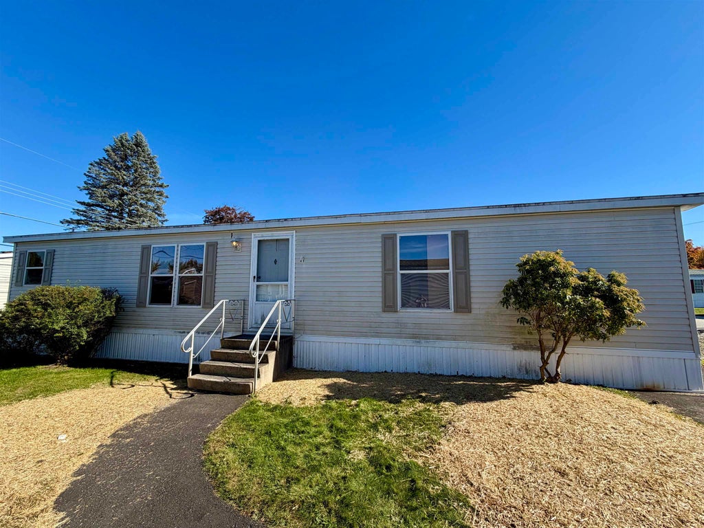 Photo of 30 Kendall Pond Road #23, Derry, NH 03038 (MLS # 5115306)