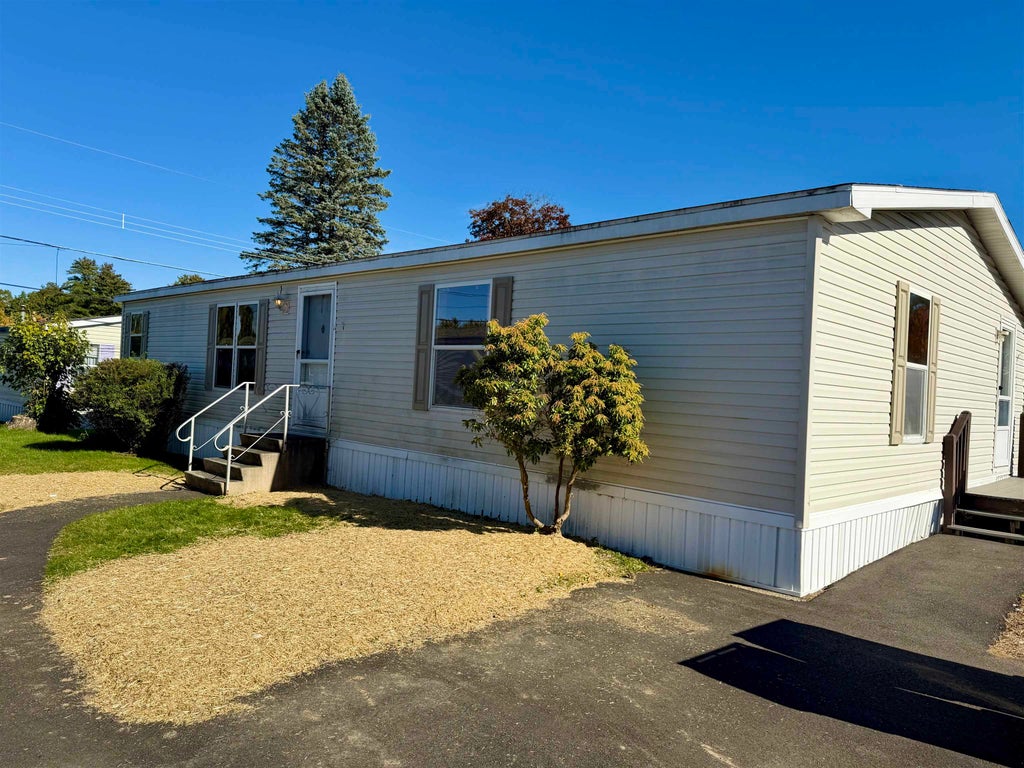 Photo of 30 Kendall Pond Road #23, Derry, NH 03038 (MLS # 5115306)