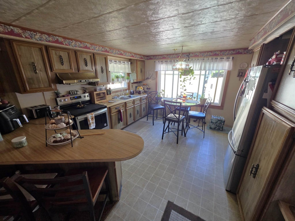 Photo of 19 River Road, Farmington, NH 03835 (MLS # 5108739)
