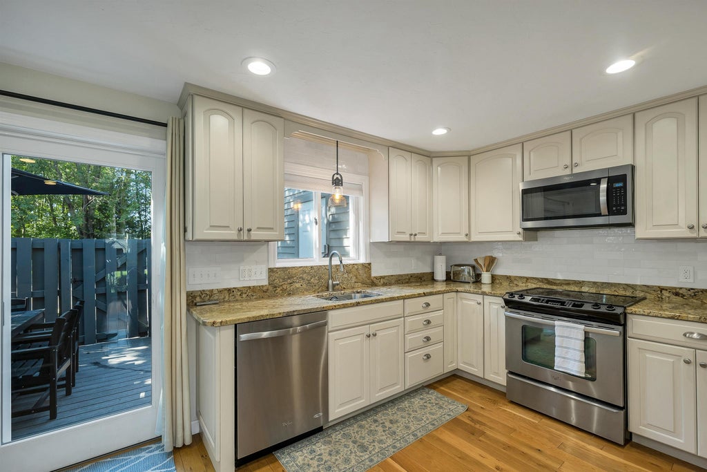 Photo of 60 Weirs Road #F3, Gilford, NH 03249 (MLS # 5110536)