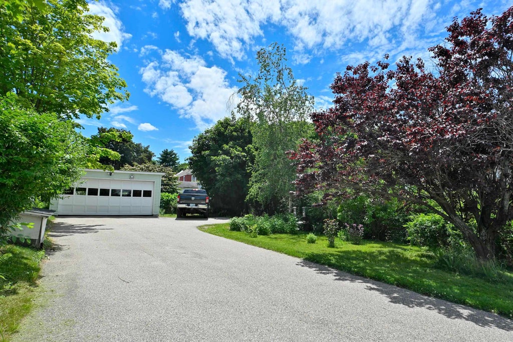 Photo of 455 Bridge Street, Manchester, NH 03104 (MLS # 5099039)