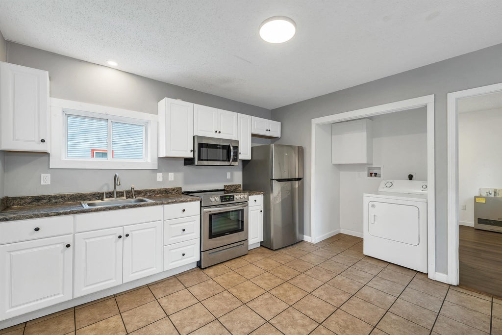 Photo of 24 Davis Place, Laconia, NH 03246 (MLS # 5114893)