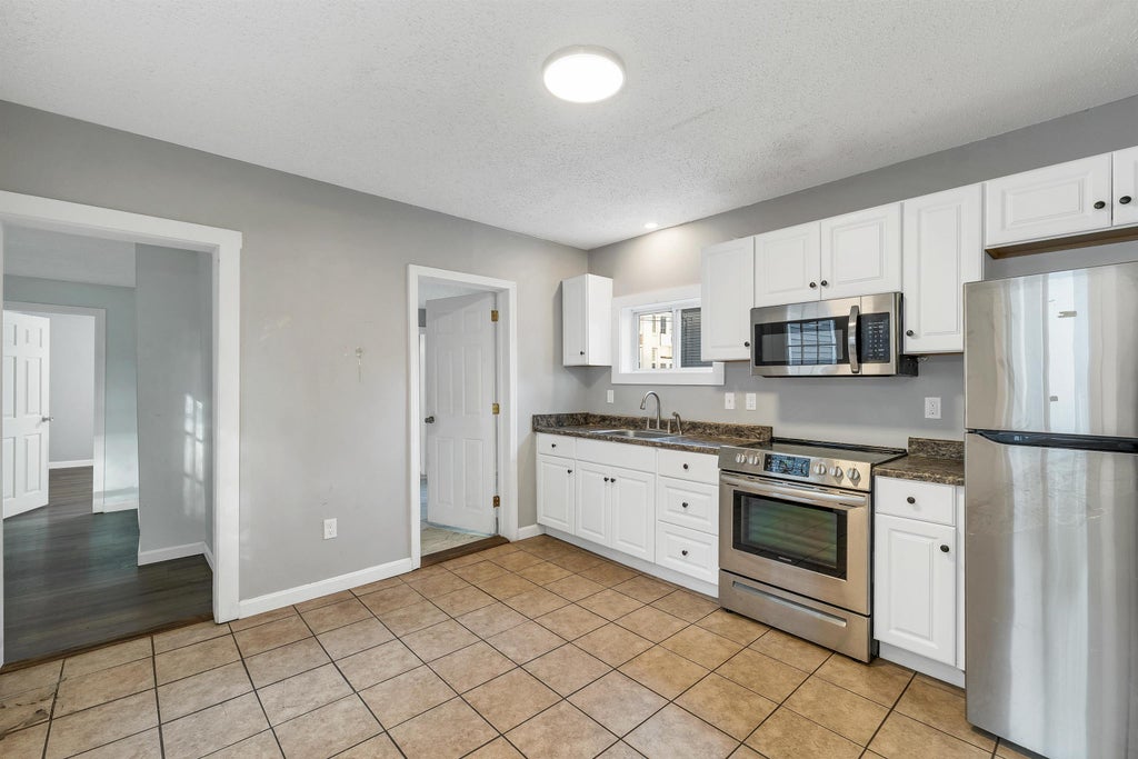 Photo of 24 Davis Place, Laconia, NH 03246 (MLS # 5114893)