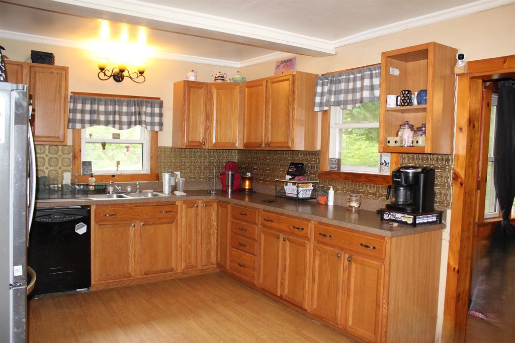 Photo of 28 Spring Street, Colebrook, NH 03576 (MLS # 5108474)