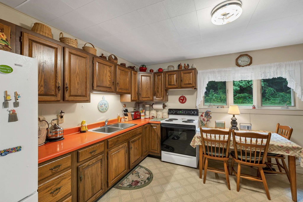 Photo of 48 Valley Street, Laconia, NH 03246 (MLS # 5109431)