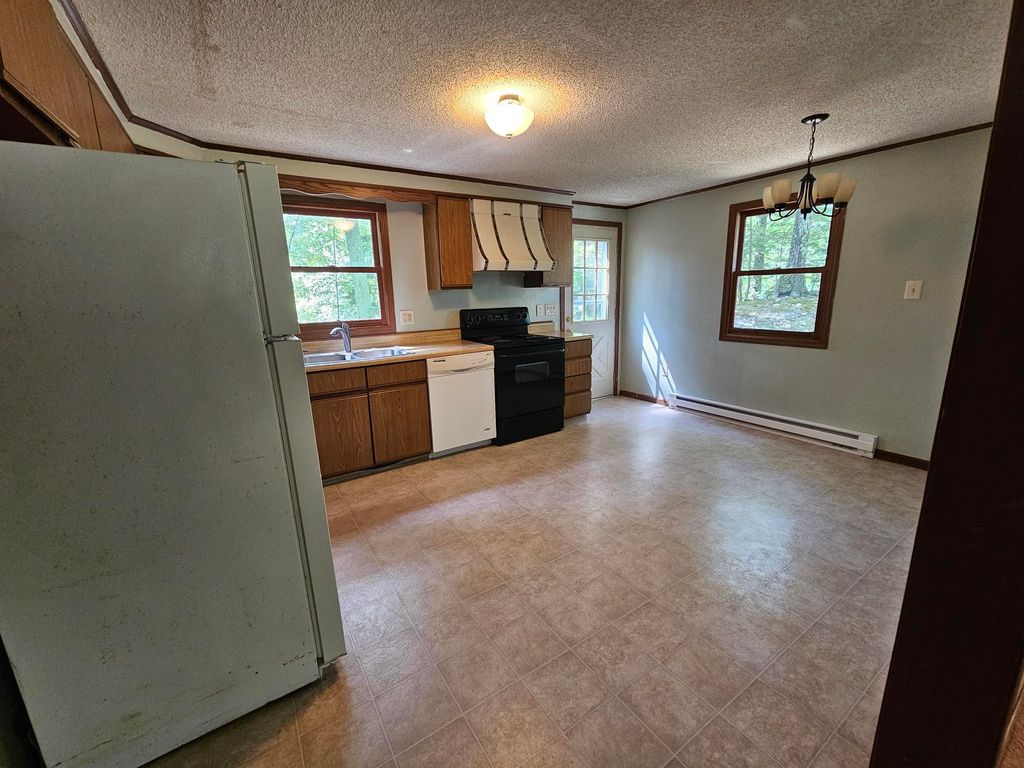 Photo of 94 Wason Road, Hudson, NH 03051 (MLS # 5100474)