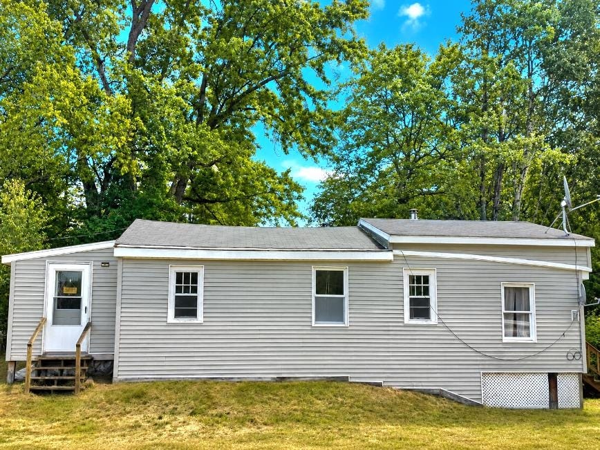 Photo of 24 Braggs Bay Road, Errol, NH 03579 (MLS # 5096903)