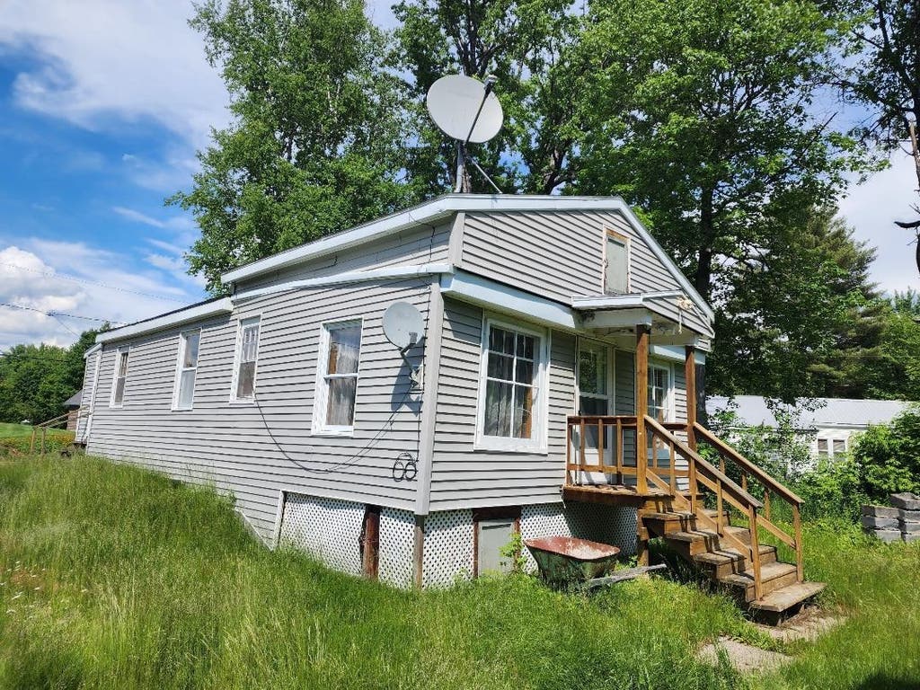 Photo of 24 Braggs Bay Road, Errol, NH 03579 (MLS # 5096903)