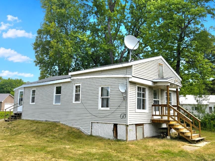 Photo of 24 Braggs Bay Road, Errol, NH 03579 (MLS # 5096903)