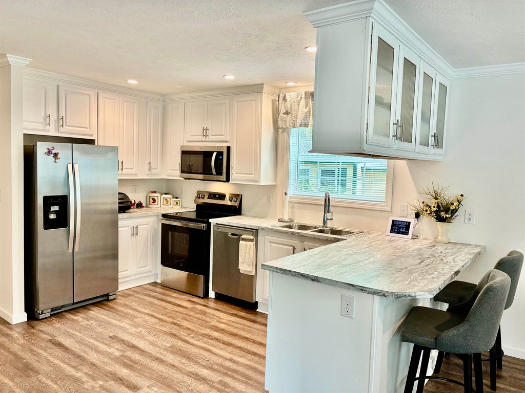 Photo of 14 Flamingo Drive, Concord, NH 03033 (MLS # 5109451)