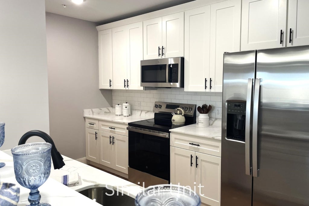 Photo of 303 Dunbar Street #109, Manchester, NH 03103 (MLS # 5099885)